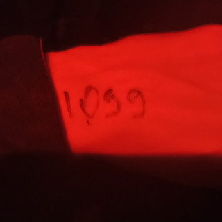 Номер в очереди, записанный на руке