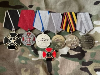 Медали, врученные Роману за службу в группе Вагнера.