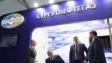 Таинственный инвестор стал скупать акции самой богатой нефтяной компании России накануне встречи Путин-Трамп