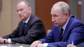 Секретарь Совета безопасности России Николай Патрушев (слева) и президент России Владимир Путин