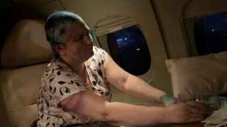 Елена Милашина в самолете после нападения