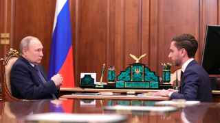Гендиректор общества «Знание» Максим Древаль на встрече с Путиным